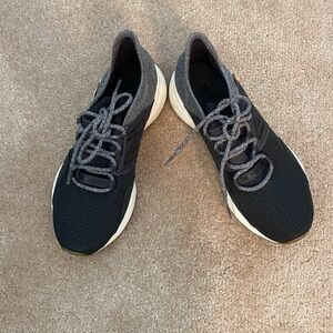 Woman’s New Balance Black and Gray Athletic Shoes